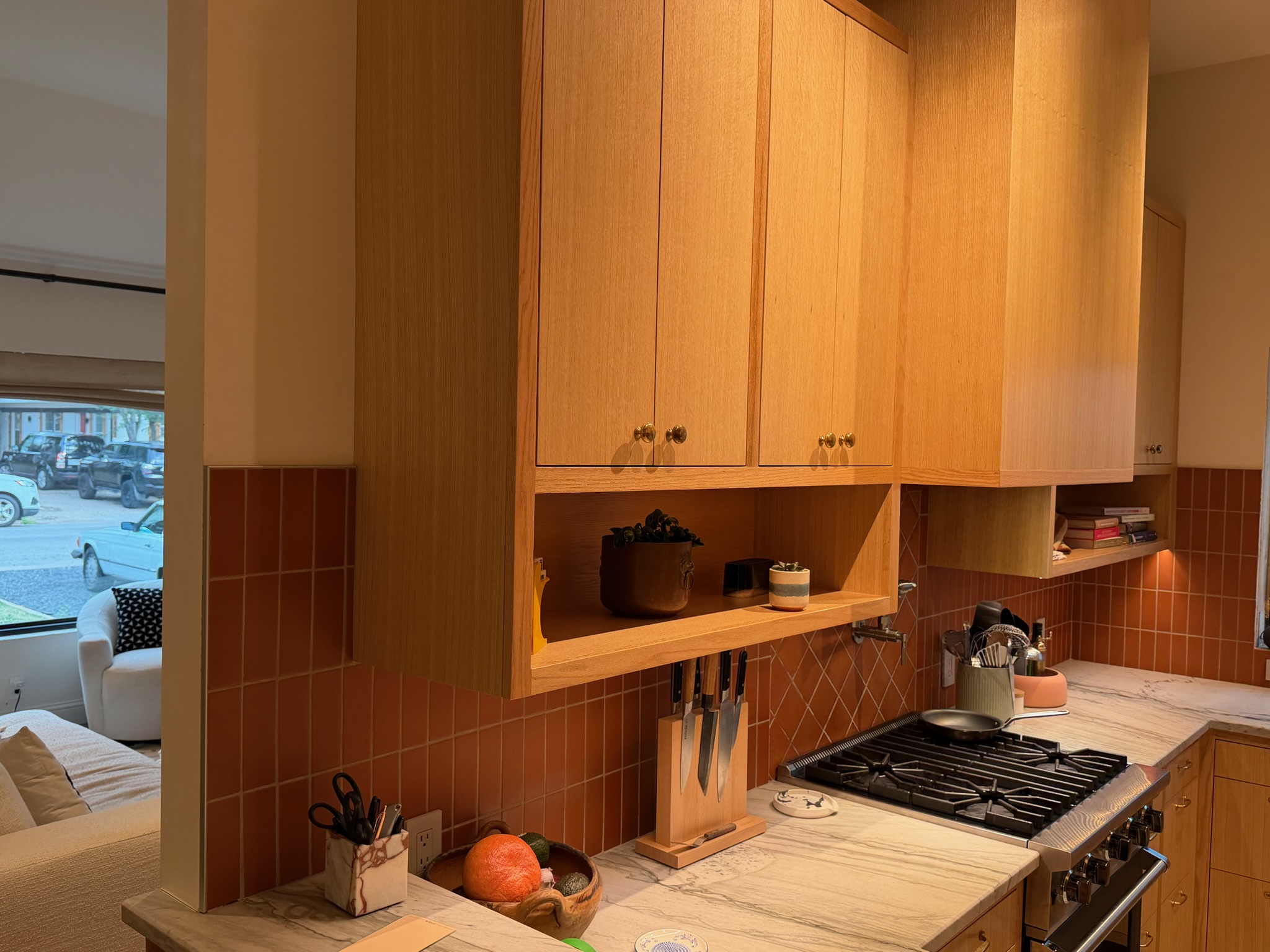 A full built-in cabinetry wall running floor to ceiling